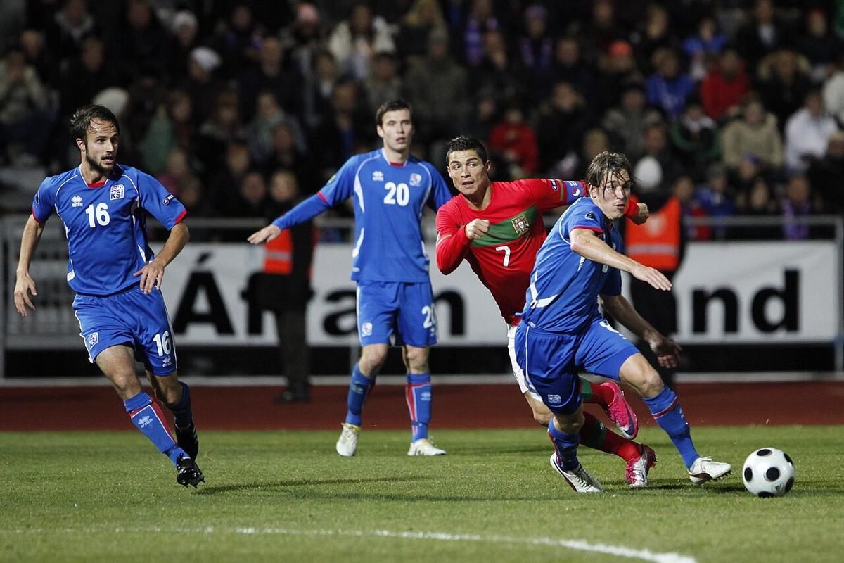 Cristiano Ronaldo playing for Portugal in a national team photograph from 2010