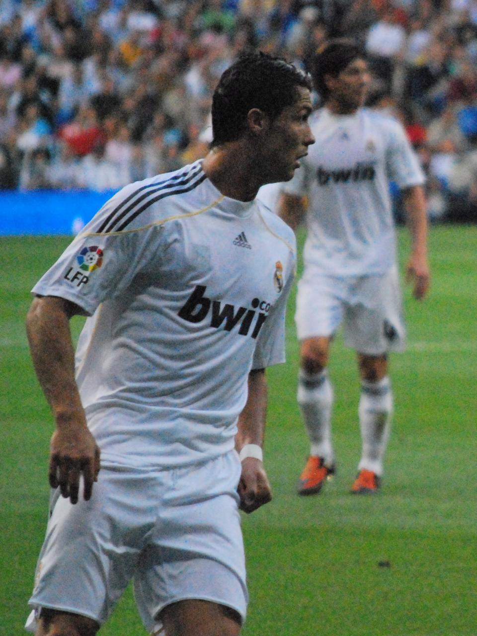 Cristiano Ronaldo in a Real Madrid shirt celebrating a goal