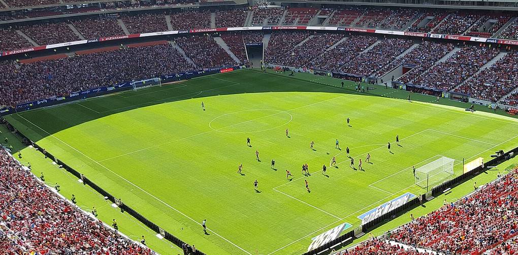 Inside the Estadio Metropolitano stadium in Madrid with rows of red seats
