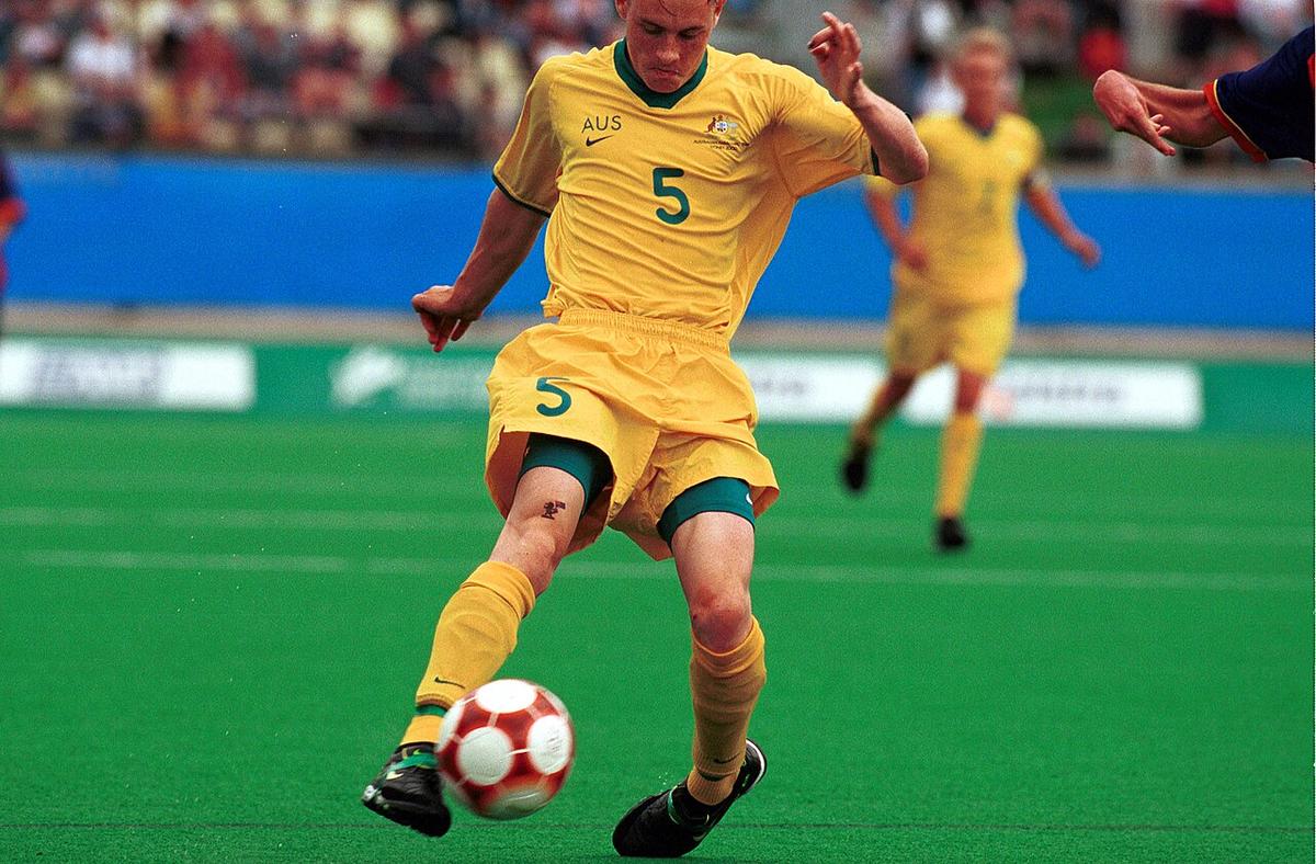 A footballer in action during a match at Sydney 2000