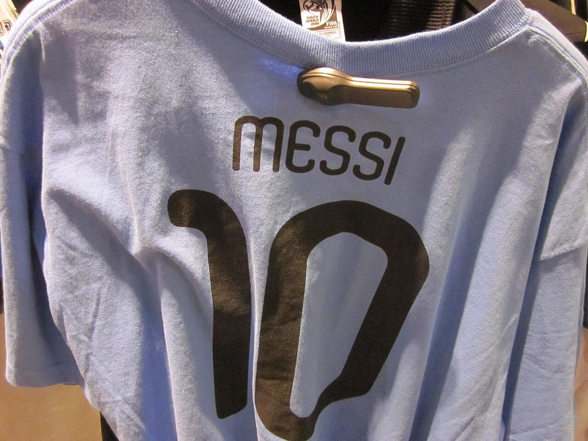 The back of a football shirt showing the player's name and number