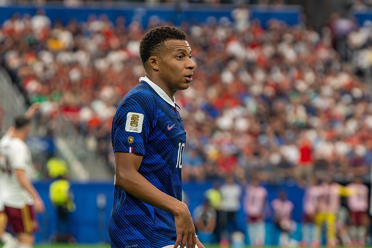 Kylian Mbappe in the blue France number 10 shirt during a match against Spain