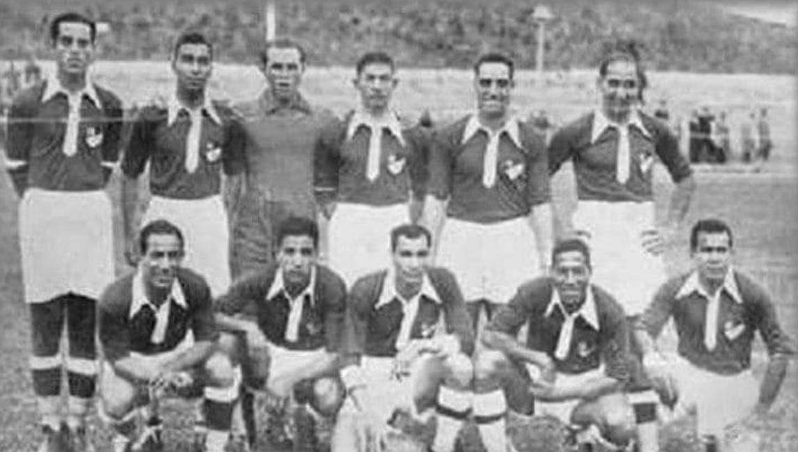 A black-and-white team photograph of the Egypt national team in 1957