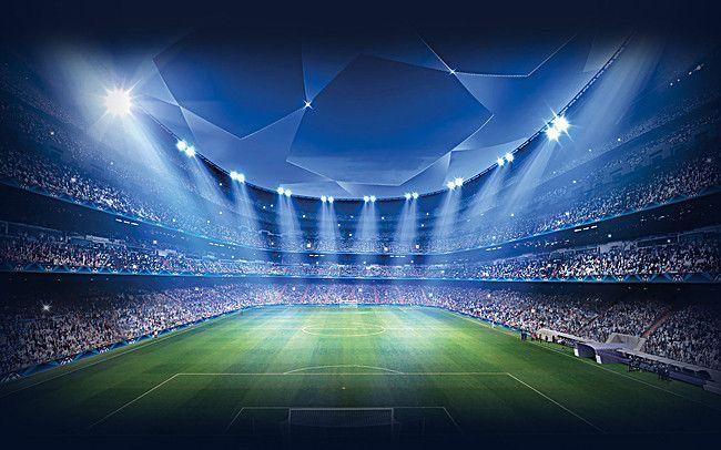 Estadio de fútbol lleno bajo los focos en un partido nocturno